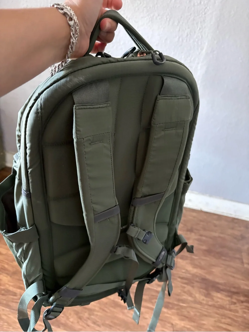 The North Face Olive Green Backpack with Rose Gold Accents